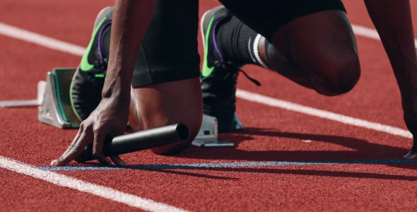 man on running field